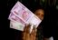Индия намерена печатать пластиковые деньги