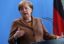 Меркель: Германия будет следить за последствиями налоговой реформы в США для компаний ФРГ
